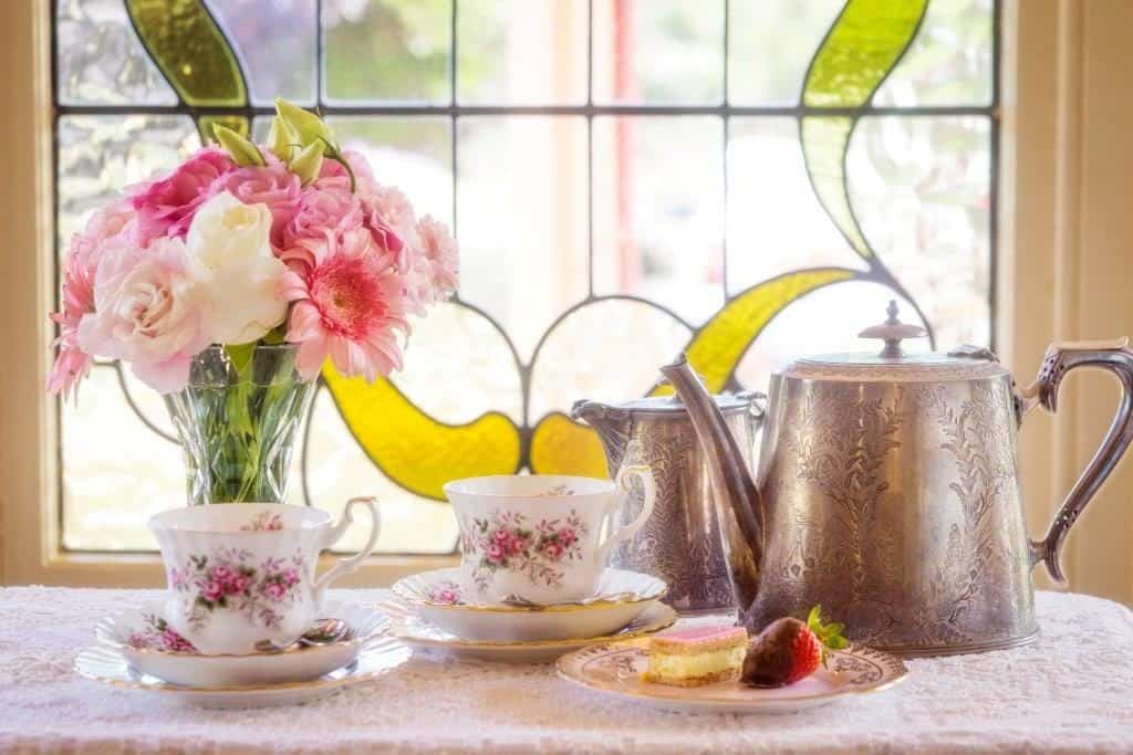 teapot cups and flowers window