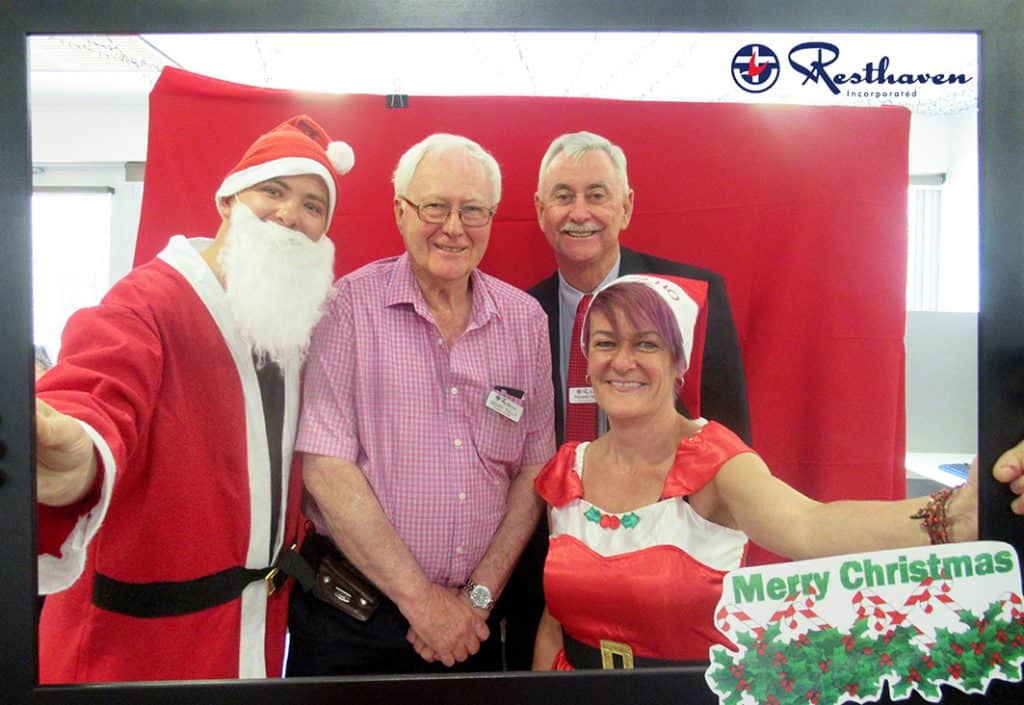 Resthaven Port Elliot staff with Geoff Tully (Board) and Richard Hearn (CEO) at the Resident Christmas Lunch with logo