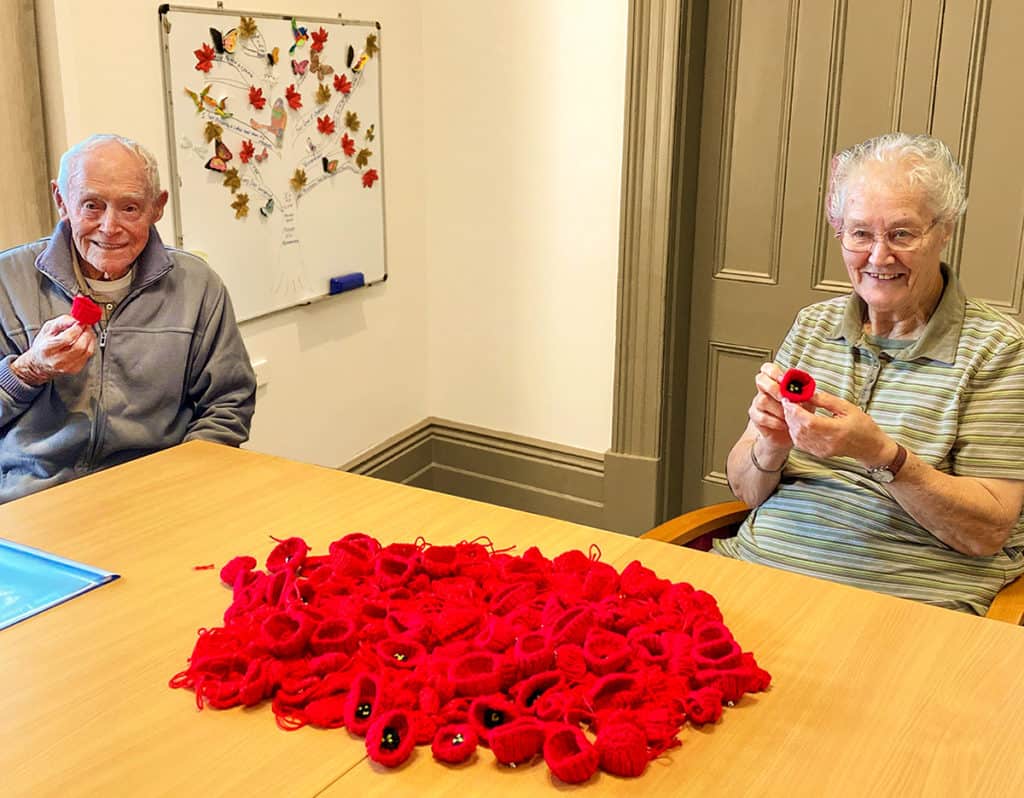 200 knitted poppies to distribute to friends on Remembrance Day