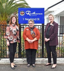 Three women standing outside of Resthaven Newland House