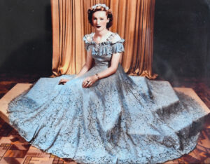 Woman wearing blue lace dress
